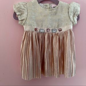 Little Lass cream with gold through out top peach bottom . EUC